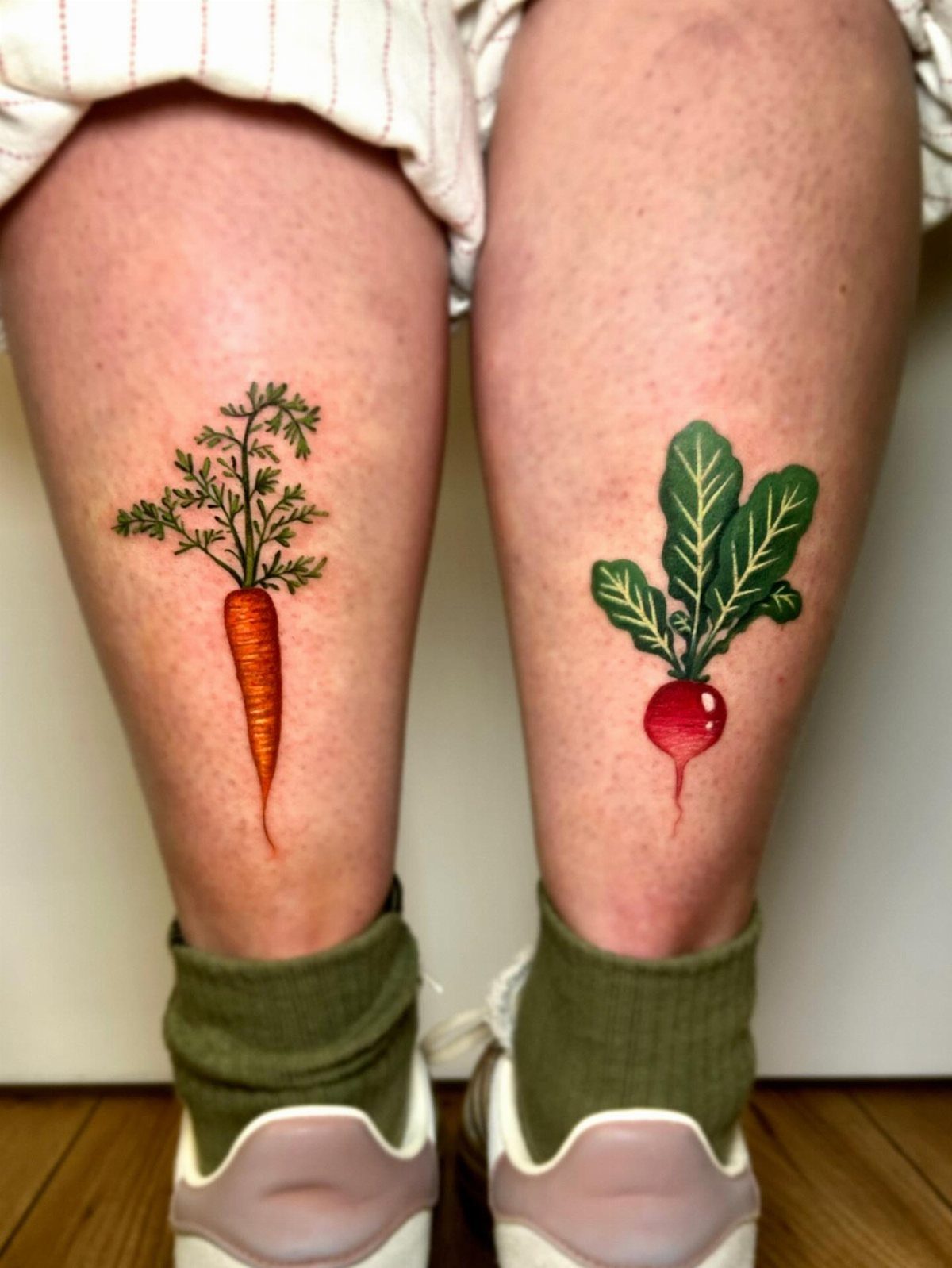 The Most Beautiful Radish Tattoo: 8 Designs for Your Next Ink 7 Two colorful vegetable tattoos, a carrot and a radish, on a person's lower legs.