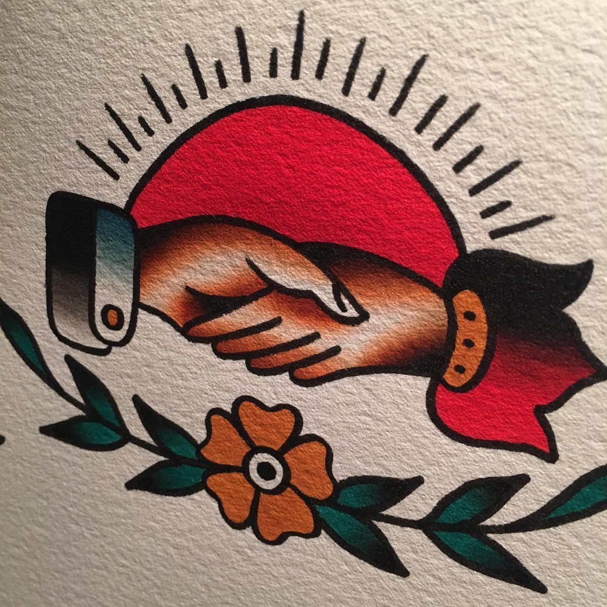 Traditional Handshake Tattoo: 9 Designs From Heart Frames to Skeleton Hands 5 Traditional tattoo design of two hands shaking in front of a red sunburst and flower.